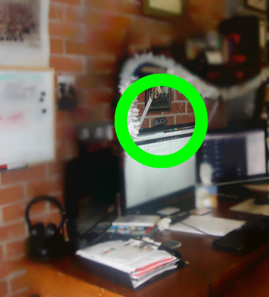 Picture showing webcam angled towards door of garage/office